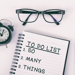 Desk,glasses, to-do list, alarm clock